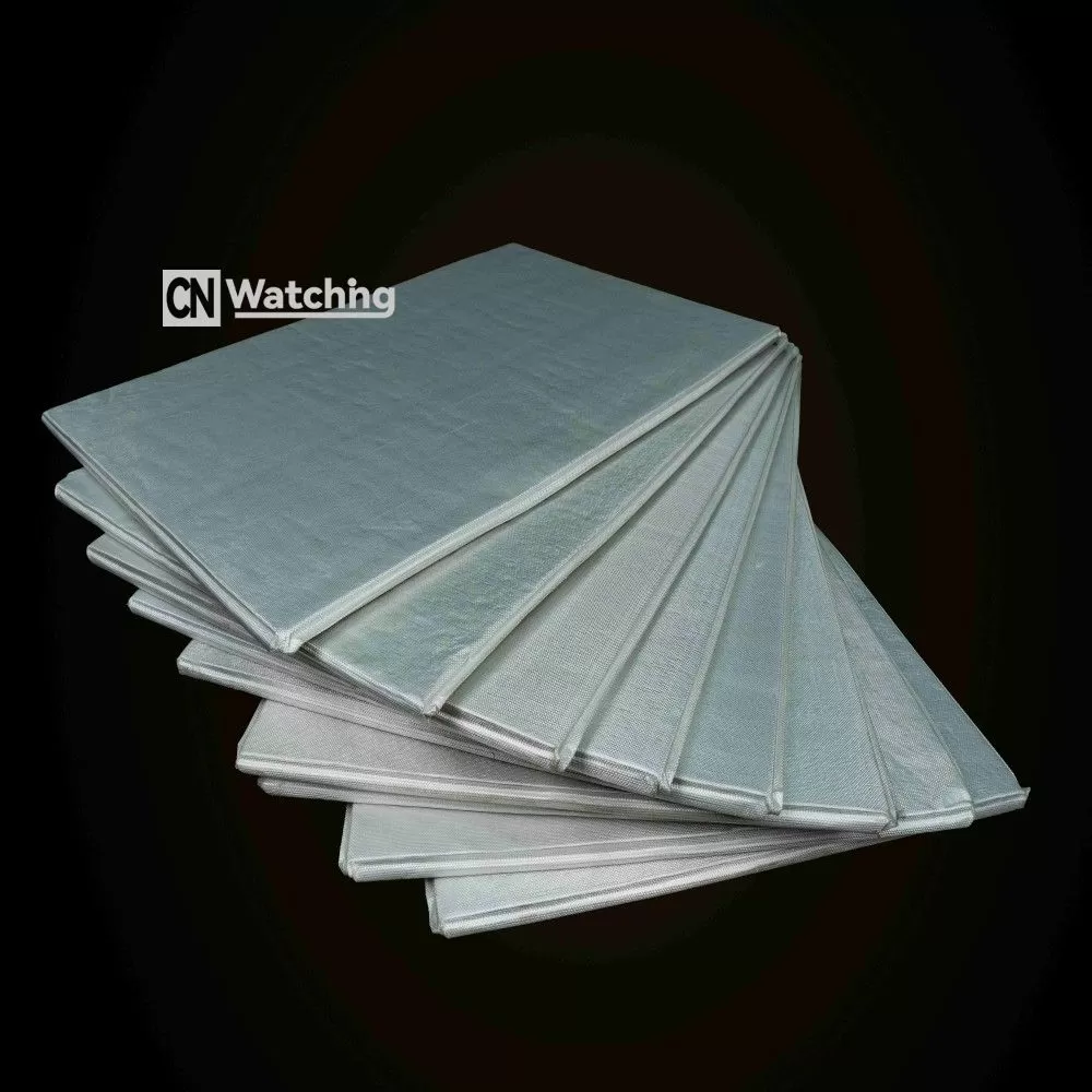 A stack of ultra-thin Vacuum Insulation Panels (VIPs) featuring a fumed silica core, delivering an industry-leading 0.002 W/m.K thermal conductivity for space-saving insulation.